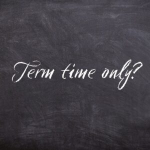 term time only written in chalk on a blackboard