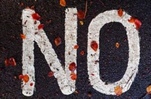 the word no painted on tarmac