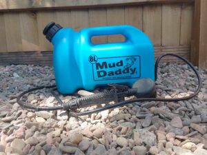 blue 8l mud daddy on gravel